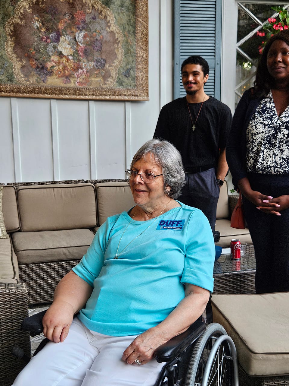 Donna with AJ and Eunice Zeigler on background Donna with AJ and Eunice Zeigler on background